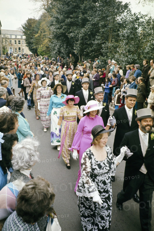 Flora Day, Helston, Cornwall, England, UK 1973 - crowds watch couples perform the  Furry dance in the streets of the town.