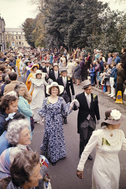 Flora Day, Helston, Cornwall, England, UK 1973 - crowds watch couples perform the  Furry dance in the streets of the town.
