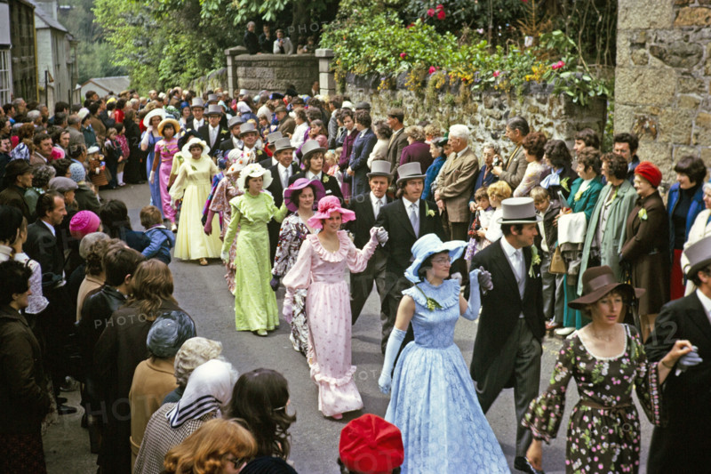 Flora Day, Helston, Cornwall, England, UK 1973 - crowds watch couples perform the  Furry dance in the streets of the town.
