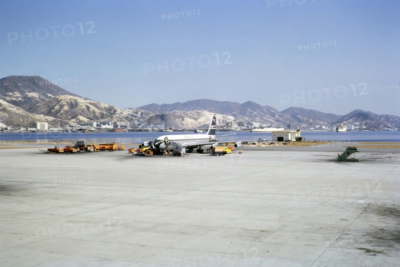 BOAC British Overseas Airways Corporation, De Havilland 106 Comet 4 jetliner plane, G-APDC,  at Kai Tai airport, Hong Kong, Asia early 1960s.