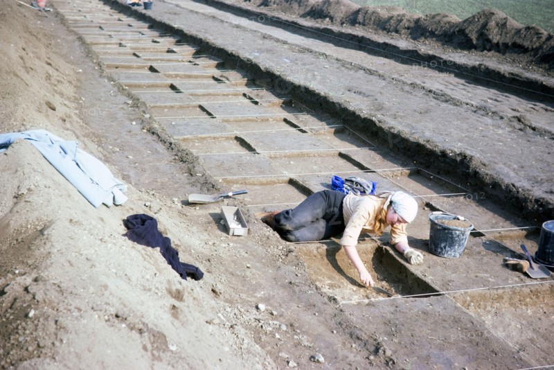 Archaeological excavation of neolithic causewayed enclosure, Great Wilbrahim, Cambridgeshire, England, UK 1976 - stripping a string grid.