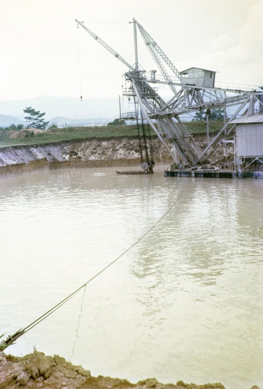 Tanjung Tualang Dredge No.5 (TT5) tin mining dredger built in England in 1938 by F.W.Payne & Son, Batu Gajah, Perak, Malaya, Malaysia, south east Asia 1965.