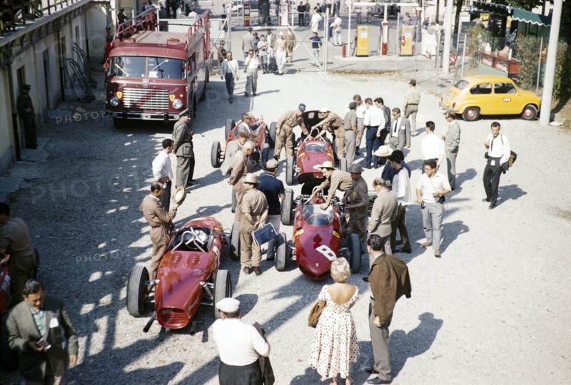 Ferrari Formula One team in paddock with sharknose Ferrari 156 F1 cars, Ferraris, Monza Grand Prix, Italy 1961 Ricardo RodrÌguez car number 8.