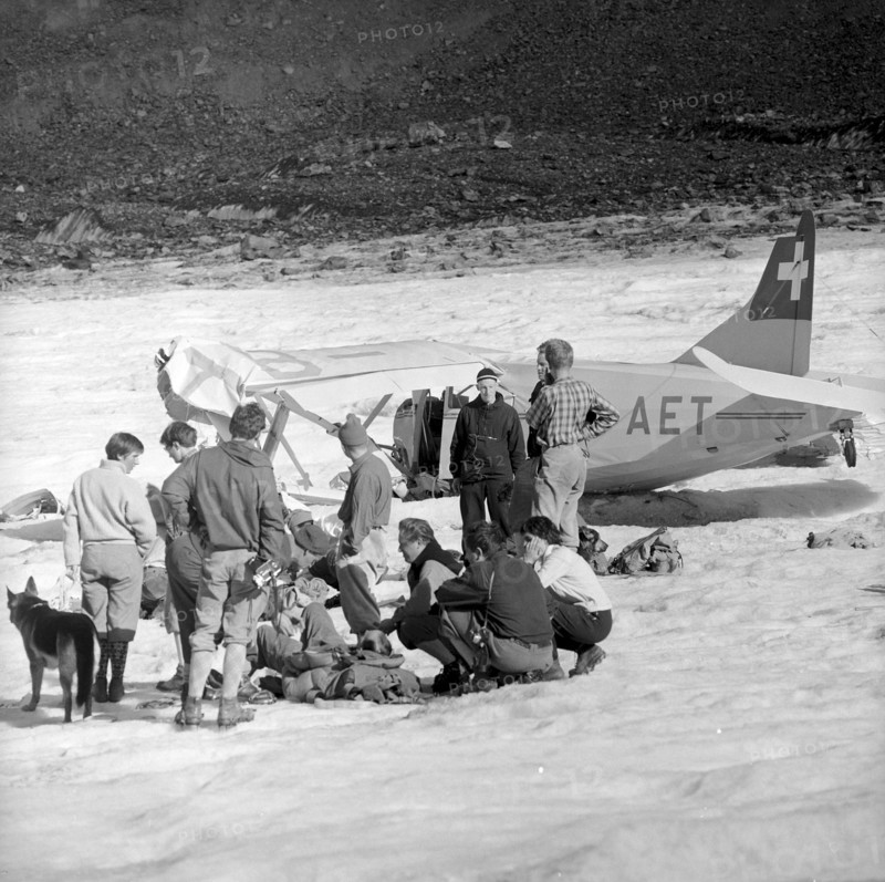 Crash of a REGA plane, wreckage upon a glacier 1957
