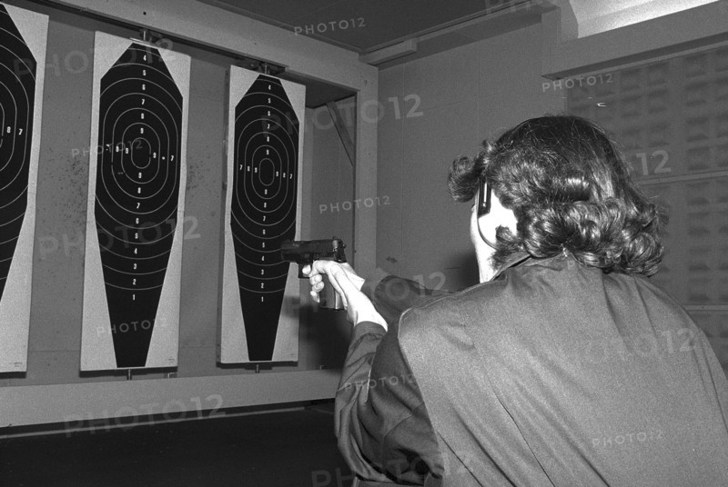 Policewoman Emma Meier at target practice 1981