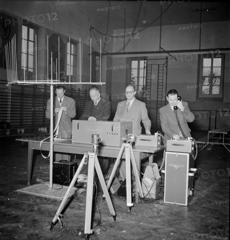 Longines technicians test the apparatus for time recording with Chronocamera, 1950