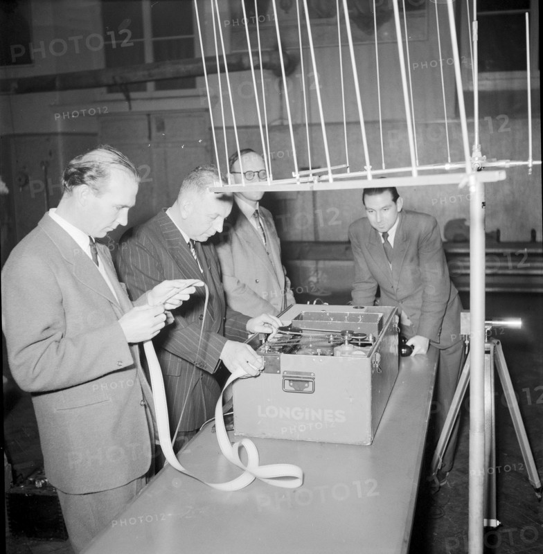 Longines technicians test the apparatus for time recording with Chronocamera, 1950