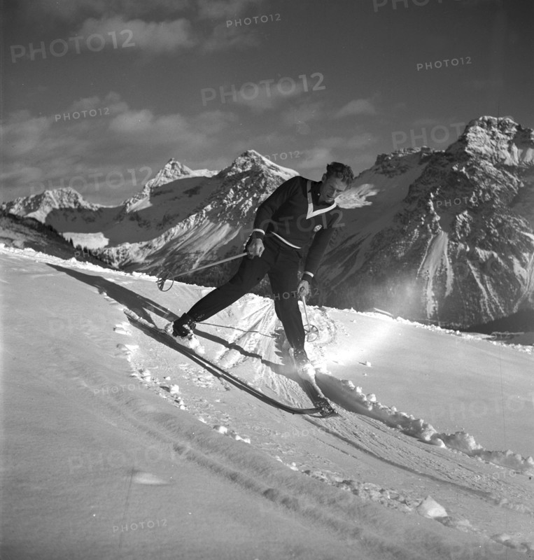 Ski instructor shows proper way to ski, stem turn, Arosa 1938