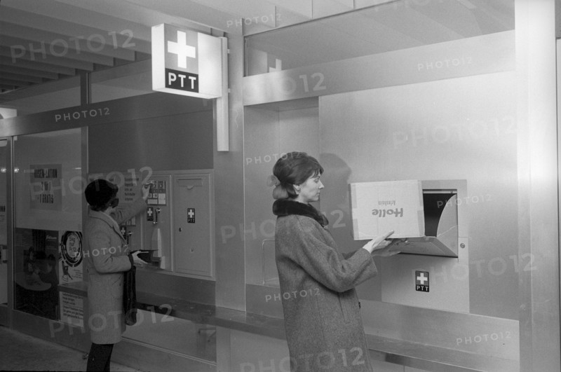 Customer at self service post office counter, Bern Gabelbach 1969