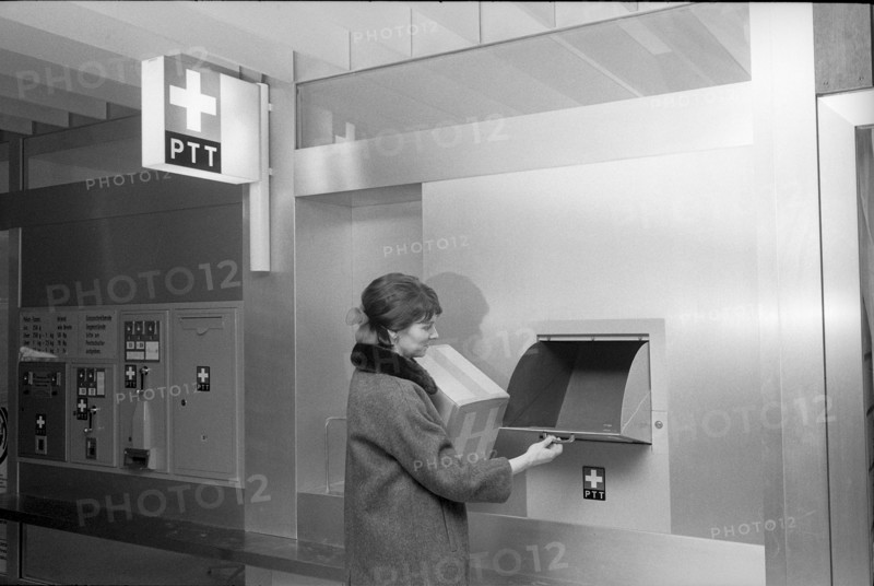 Customer at self service post office counter, Bern Gabelbach 1969