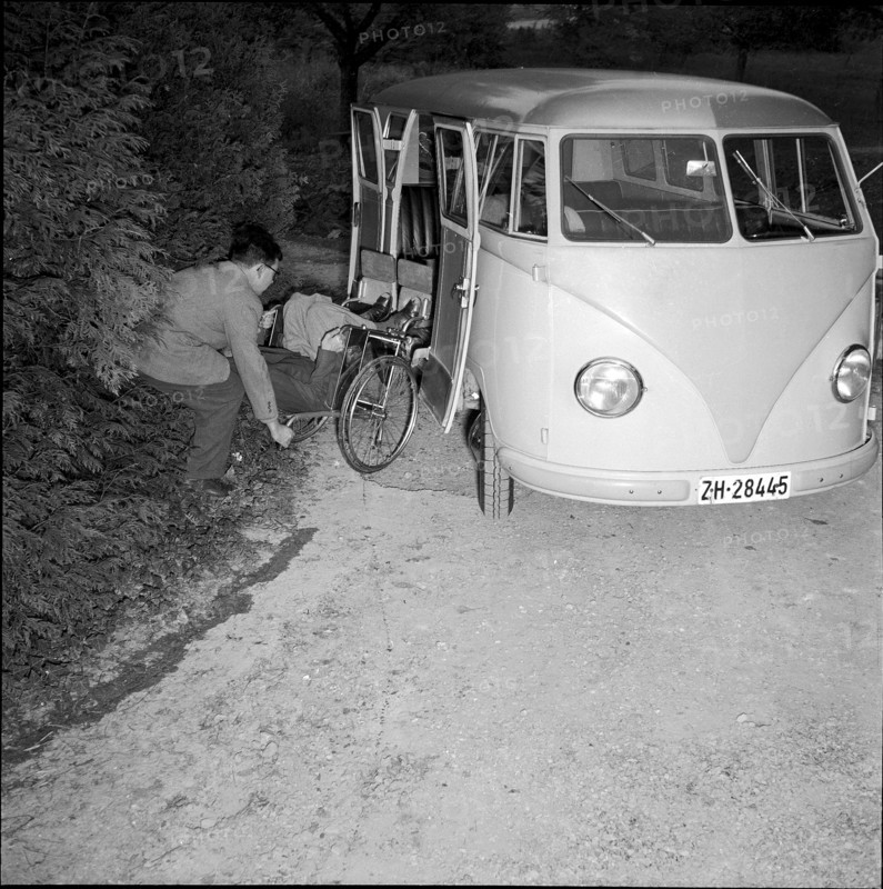 Loading wheelchair in a Volkswagen at school for social work, Zurich 1953