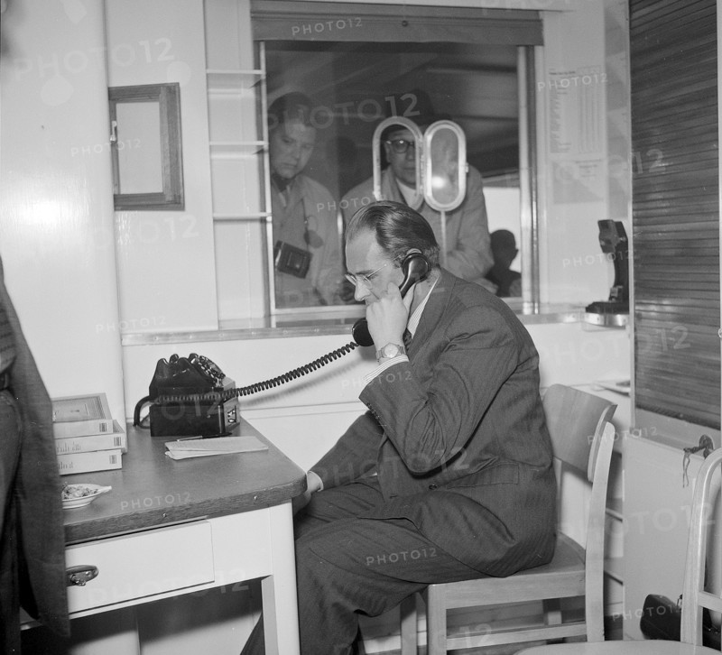 Maiden voyage of MS Linth on Lake Zurich, man on the phone 1952