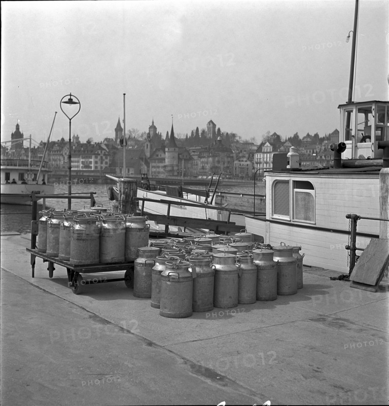 Lucerne, milk cans ready to transport by ship, Lake Lucerne 1940