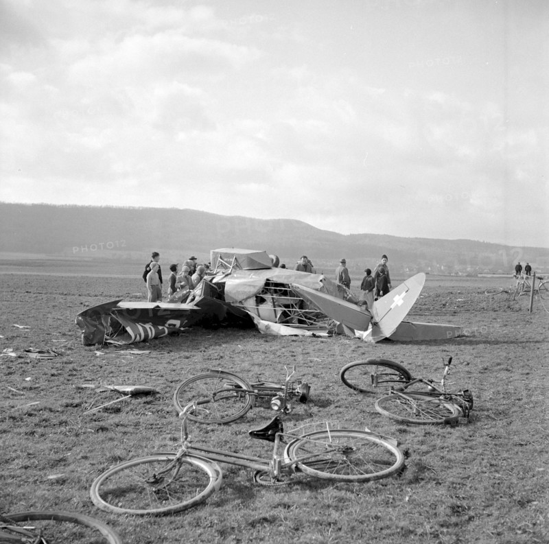 Crash of a REGA plane, people watching the wreckage near Birrfeld 1957