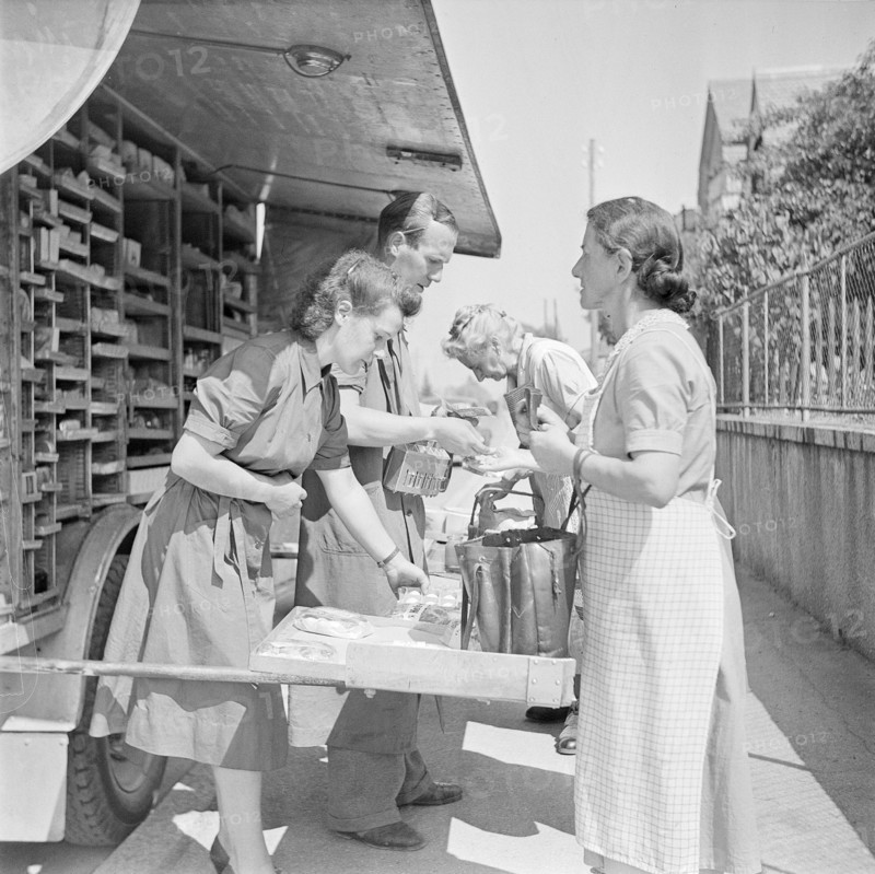 Zurich, Customers shopping in a Migros truck, mobile shop. Zurich 1947