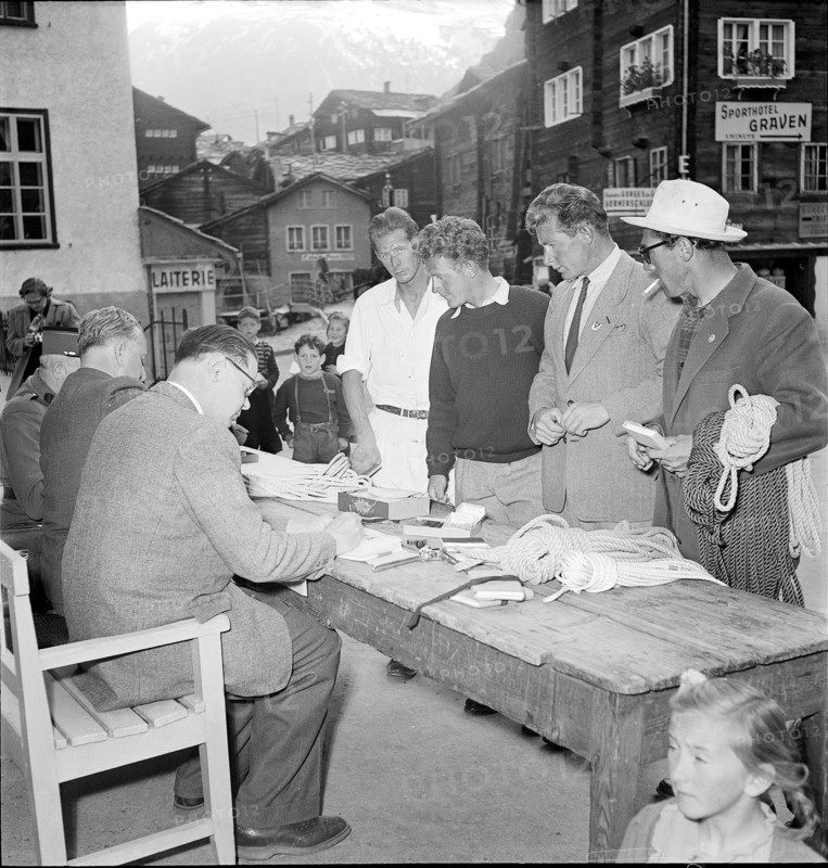Mountain guide inspection, Zermatt 1952: certificate is stamped, stamping