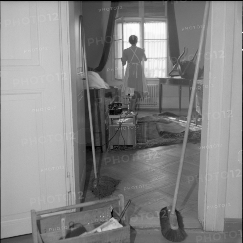 Basle, chambermaid cleaning a room, Hotel drei Konige 1954