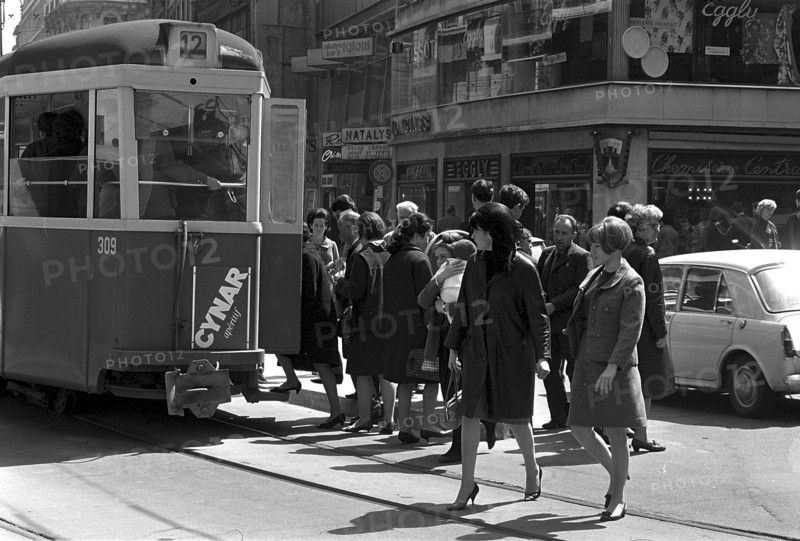 Woman crossing a road in Geneva 1966