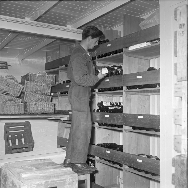 Wine bottles storeroom aboard the ship ""Linth"", 1952