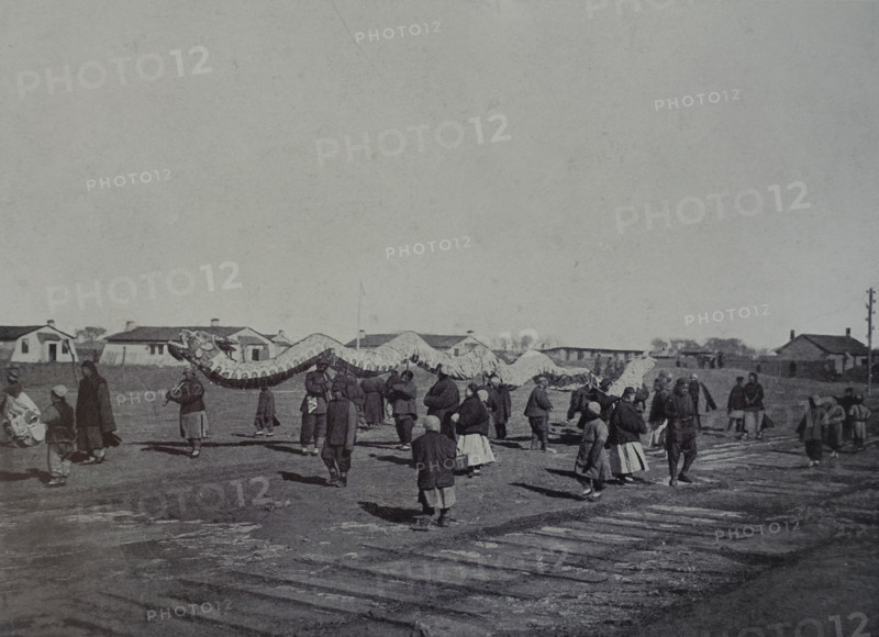 New Year's procession with a dragon in Mukden Art album Manchuria Russo-Japanese War 1906