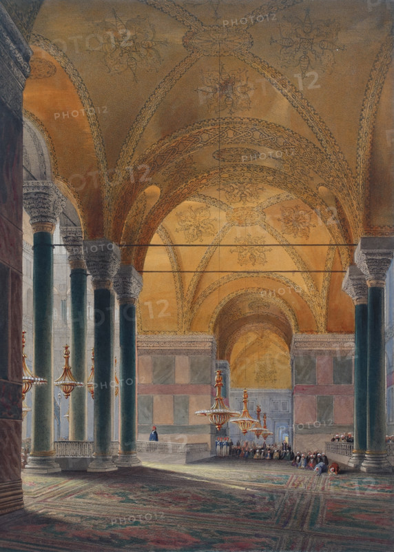 View of the entrance from the north side of Ayasofya Mosque with groups of men in traditional dress.