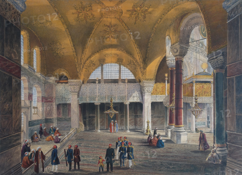 Central view of the north nave of Ayasofya Mosque with groups of men in traditional dress.