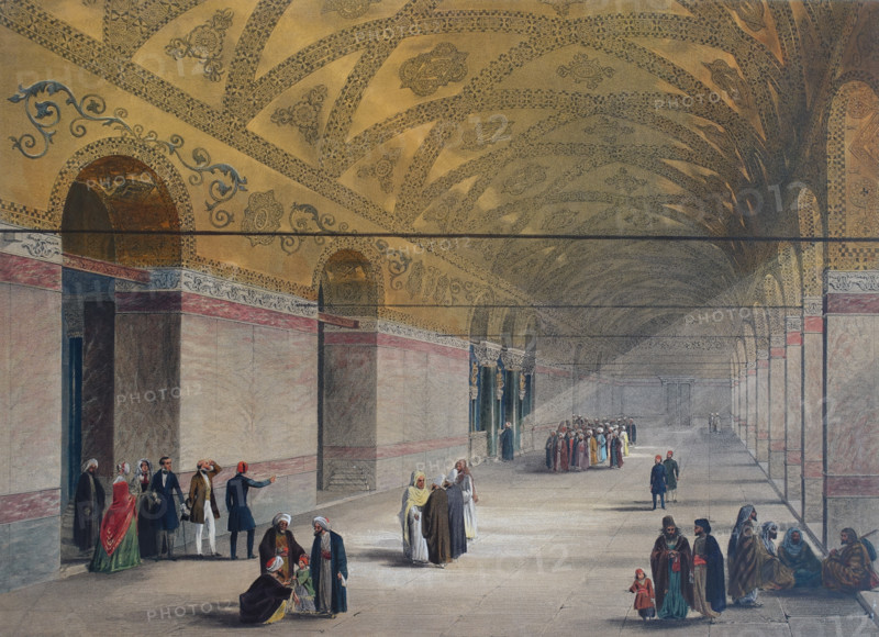 Entrance to the gynoecium or upper gallery of Ayasofya Mosque with groups of people in traditional dress.