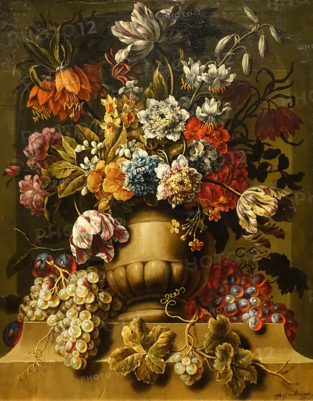 Flowers in a stone vase.
