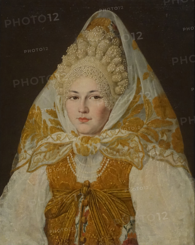 A Toropets merchant's wife in a headscarf woven with gold thread.
