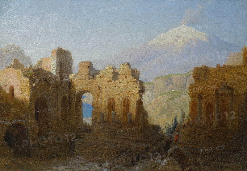 View of Etna from the ruins of the ancient Greek theater in Taormina, Sicily.