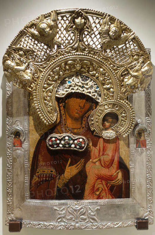 Icon of the Mother of God of Tikhvin with images of saints in the margins.