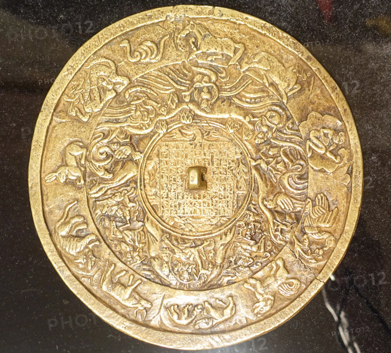 Disk amulet.