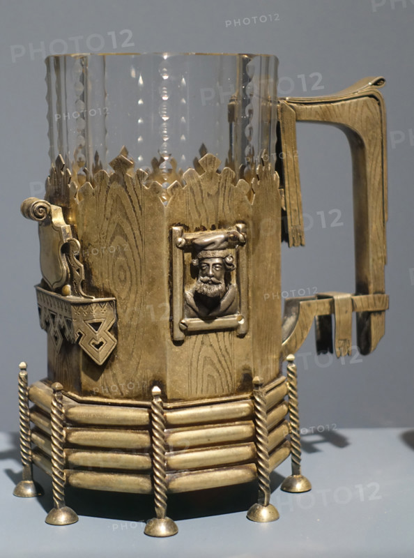 Glass holder with glass.