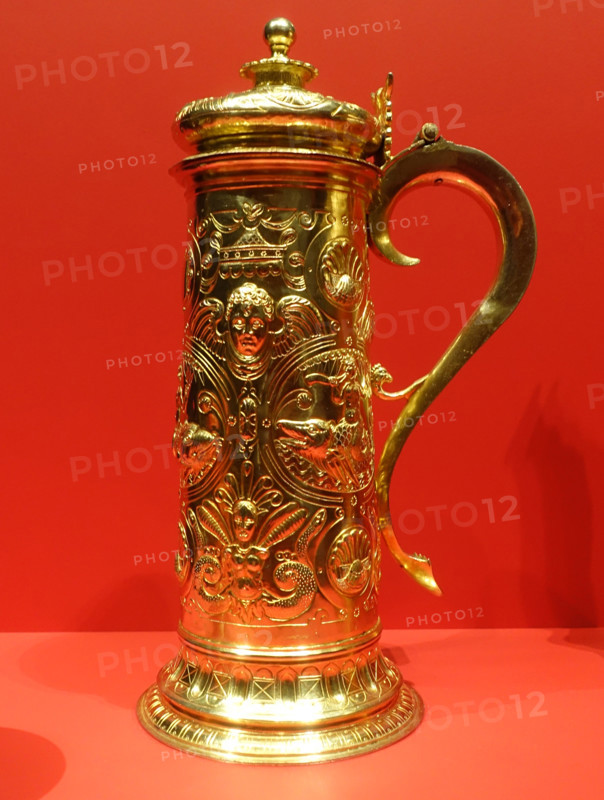 Cup with lid.