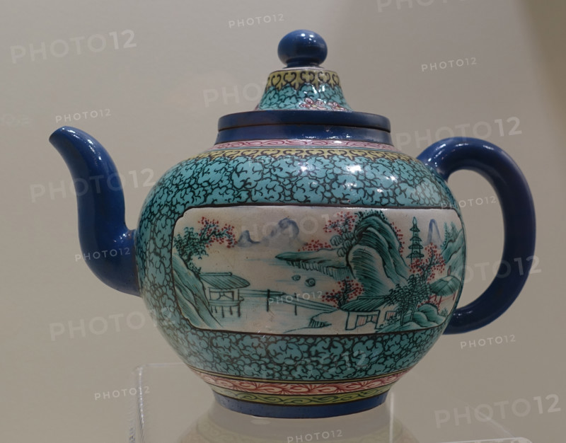 Teapot with landscapes.