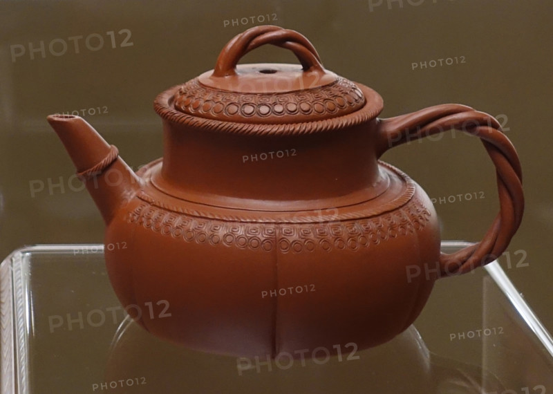 Teapot with geometric ornament.
