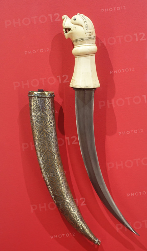 Dagger with scabbard.