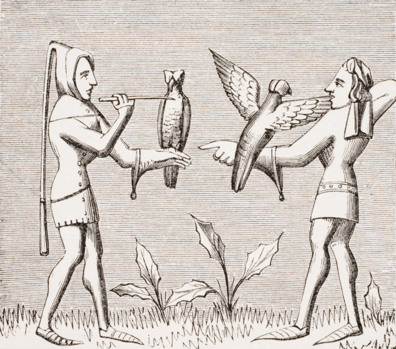 Falconers dressing their birds. 19th century reproduction of miniature in 14th century manuscript Livre du Roy Modus by Henri de Ferrières.