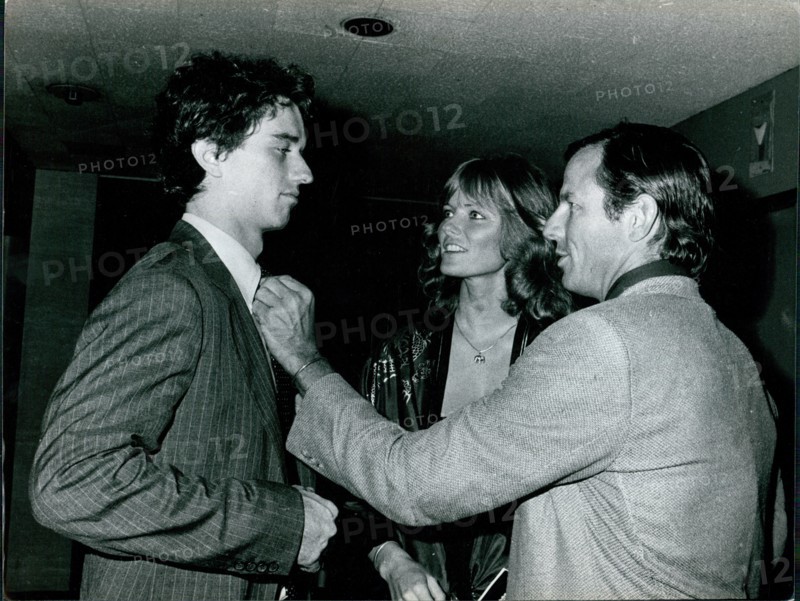Actress Cheryl Tiegs watches boyfriend, photographer Peter Beard adjust Robert F Kennedy Jr.'s tie