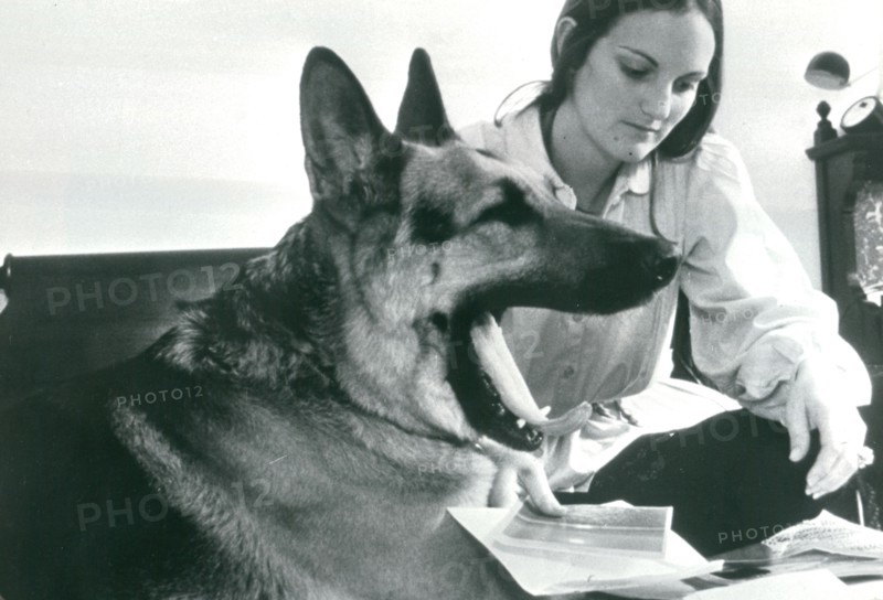 Patty Hearst Shaw with one of her dogs