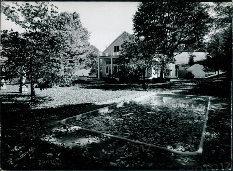 View of the swimming pool and yard at Jackie Onassis' home in Peapack, New Jersey