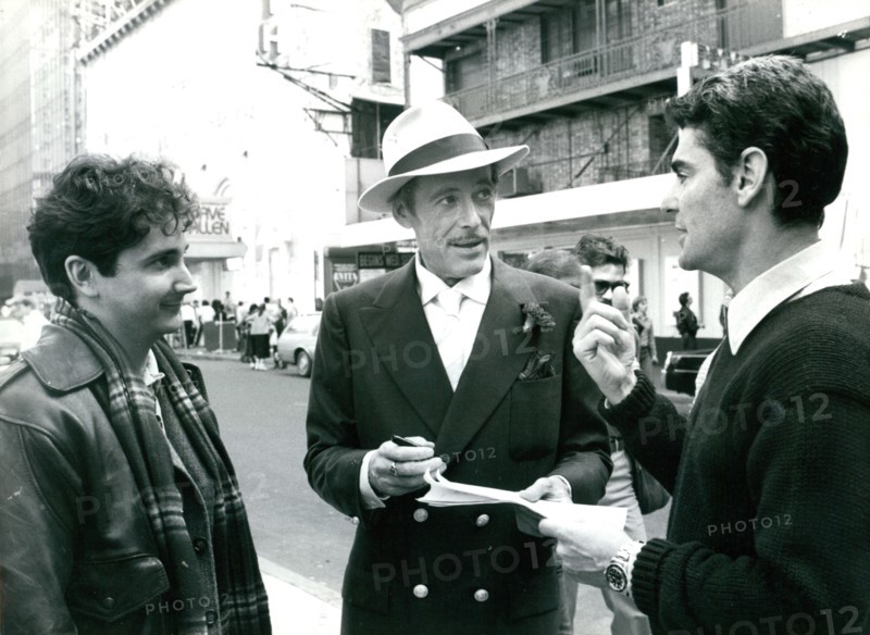 Peter O'Toole on set in New York for the film ""My Favorite Year"", seen with co-star Mark Linn-Baker (left) and director Richard Benjamin (right)