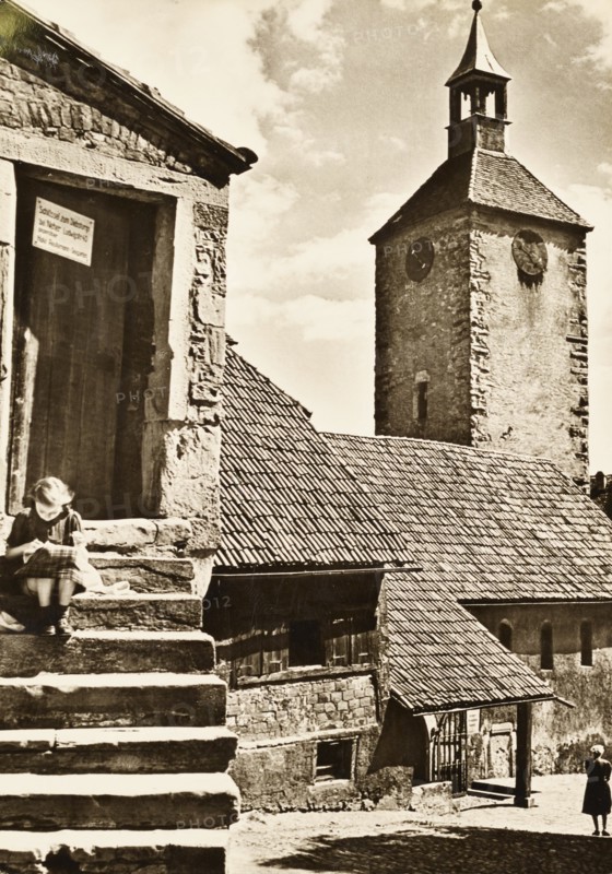 Germany, animated view of the medioeval Lindau, Bodensee with the historic Diebsturm Robbers' Tower and the Peterskirche, 1950 circa