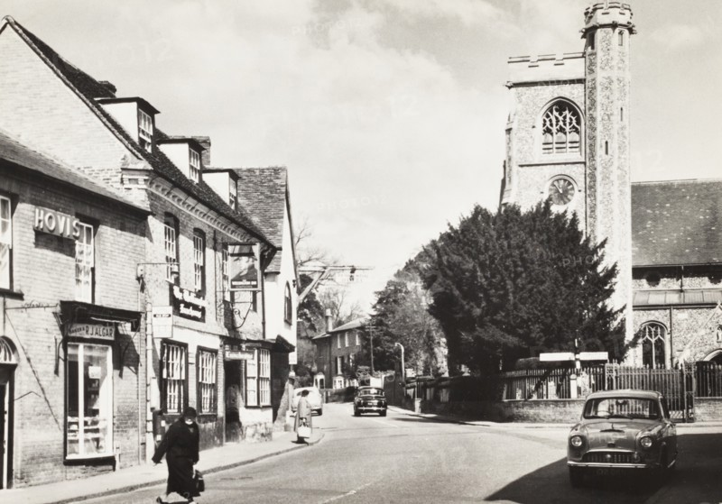 United Kingdom, Hertfordshire, Welwyn High Street with Saint Mary's Church, 1955 circa