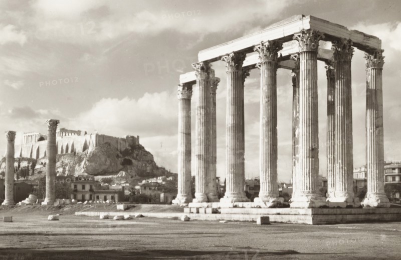 Athens Greece, Temple of Olympian Zeus In the background,  the Acropolis hill with the Parthenon, 1900 circa