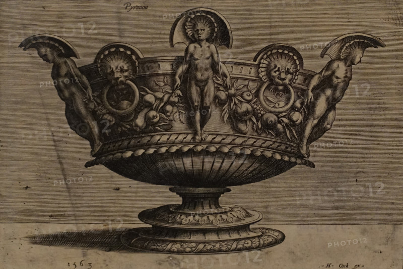 A Vessel decorated with nude figures holding a garland of fruit
