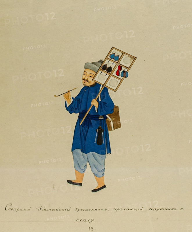A northern Chinese peasant selling earpieces and mica