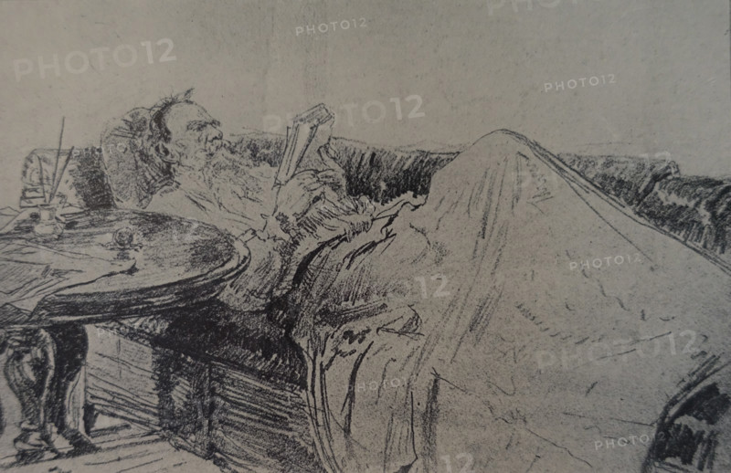 Leo Tolstoy (1828-1910) is reading