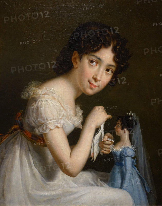 Girl with a Doll