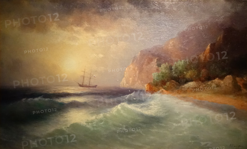 Seashore with a sailboat